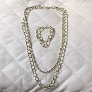 Silver double chain necklace w/ matching bracelet.